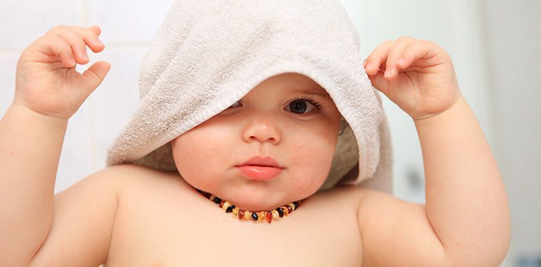 bébé collier d'ambre dent